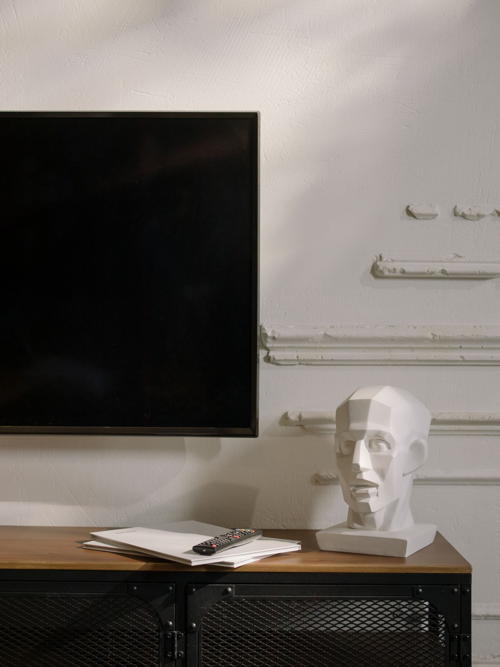 Flat-screen television mounted cleanly on a modern wall