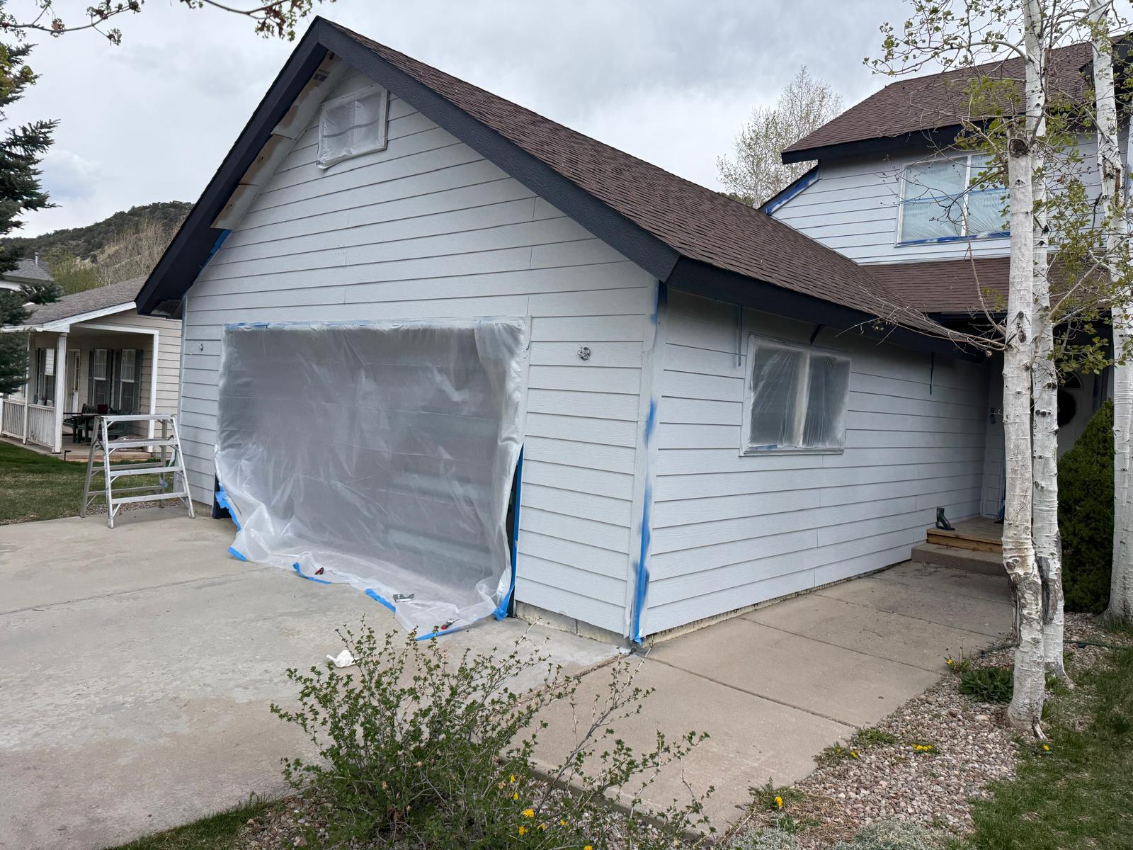 Full Exterior Repaint — Two-Story Home
